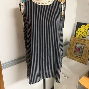 Like new. Black and white stripe blouse